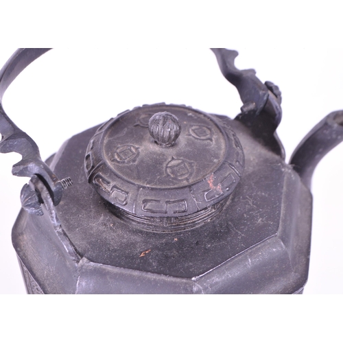 285 - An early 20th century Chinese pewter teapot. Circa 1920s with hand painted panels, swing carry handl... 