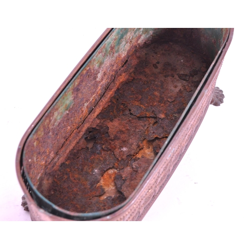 287 - A 19th century small copper planter pierced woven effect raised on lion paw feet. With a rusted meta... 
