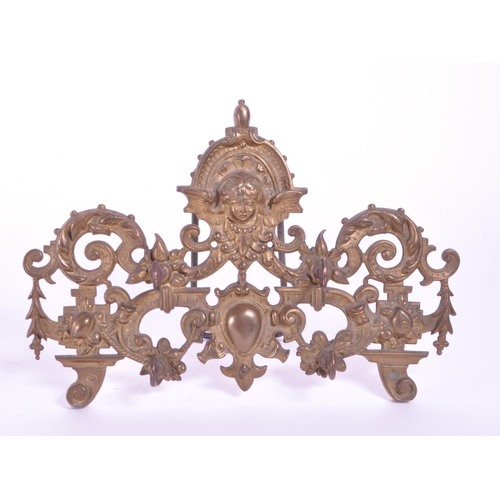 288 - A vintage 20th century brass acanthus leaf table hook stand. With acanthus leaf decoration with fema... 