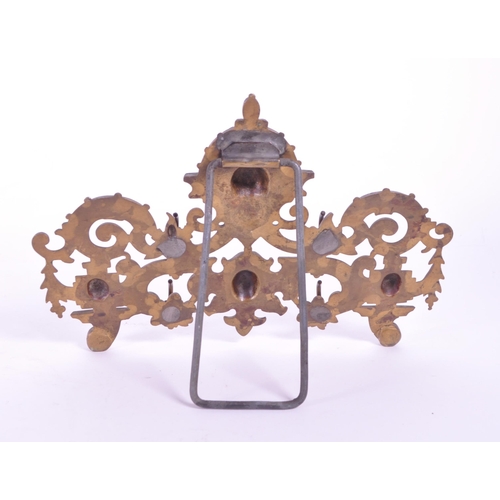 288 - A vintage 20th century brass acanthus leaf table hook stand. With acanthus leaf decoration with fema... 