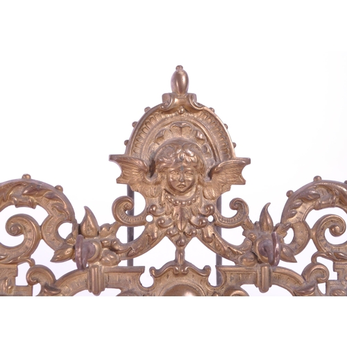 288 - A vintage 20th century brass acanthus leaf table hook stand. With acanthus leaf decoration with fema... 