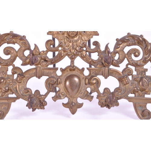 288 - A vintage 20th century brass acanthus leaf table hook stand. With acanthus leaf decoration with fema... 