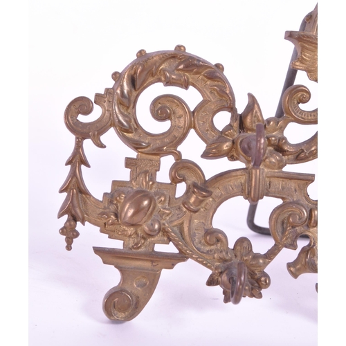 288 - A vintage 20th century brass acanthus leaf table hook stand. With acanthus leaf decoration with fema... 