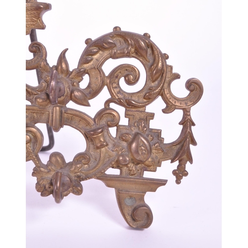 288 - A vintage 20th century brass acanthus leaf table hook stand. With acanthus leaf decoration with fema... 