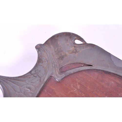 293 - Early 20th century art nouveau style serving tray, comprised of a wooden teak base and pewter moulde... 