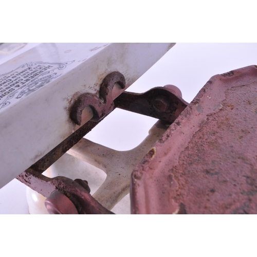 296 - Herbert & Sons - Early 20th century cast iron Kings Cross Ltd weighing scales. Painted in white ... 