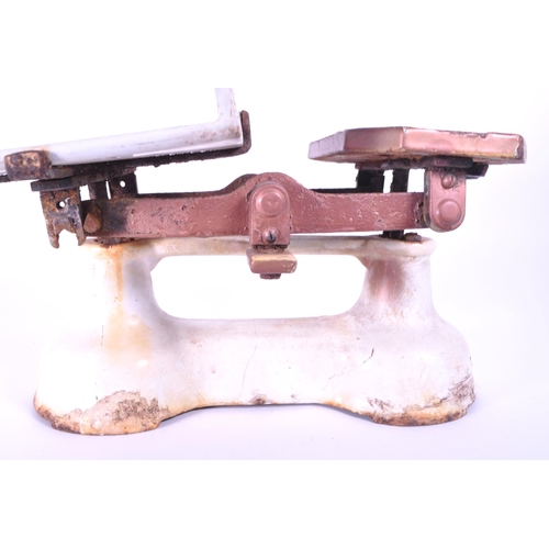 296 - Herbert & Sons - Early 20th century cast iron Kings Cross Ltd weighing scales. Painted in white ... 