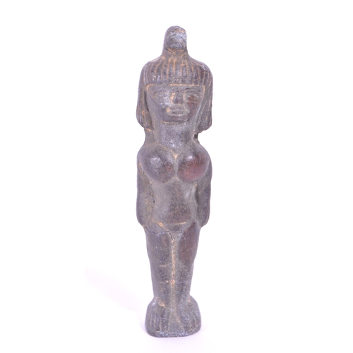 297 - A bronze Astarte deity statue figure. Prosperity goddess of fertility. In a standing position with a... 