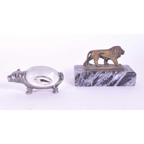 298 - Two vintage 20th century South African Eswatini giftware. Hand made wild cat with clear bulbous body... 