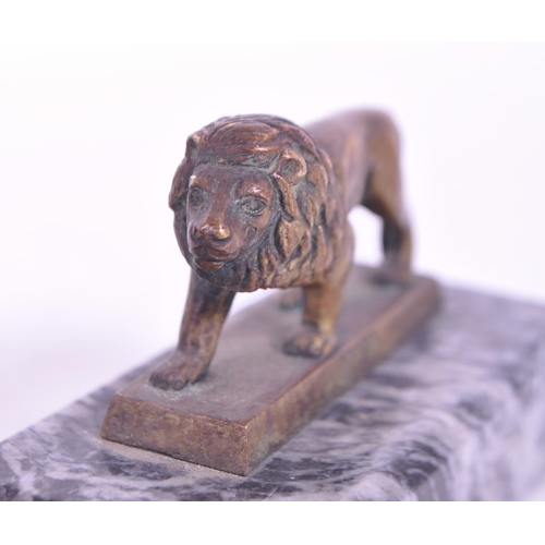 298 - Two vintage 20th century South African Eswatini giftware. Hand made wild cat with clear bulbous body... 