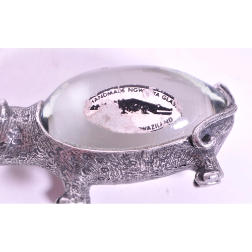 298 - Two vintage 20th century South African Eswatini giftware. Hand made wild cat with clear bulbous body... 