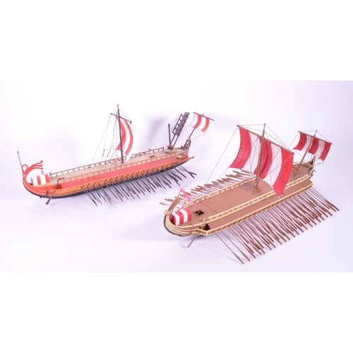 340 - Two late 20th century scratch built sailing Greek / Roman trireme warship. Having multiple oars with... 