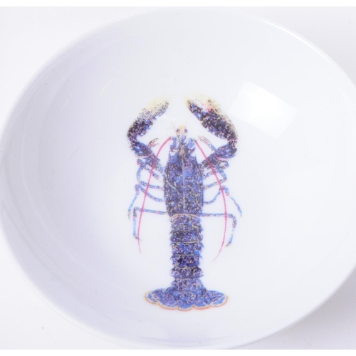 368 - De Limoges - Eight French Richard Bramble porcelain small seafood dishes each decorated with a diffe... 