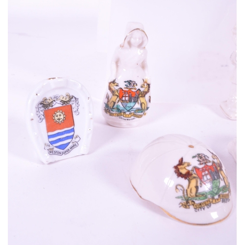 378 - Collection of early 20th century City of Bristol crested china porcelain figures. Comprised of lidde... 