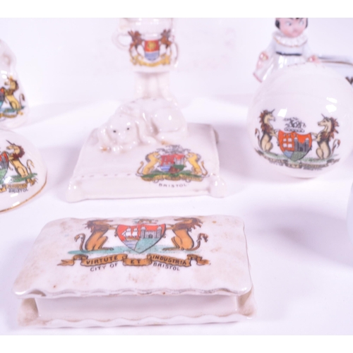 378 - Collection of early 20th century City of Bristol crested china porcelain figures. Comprised of lidde... 