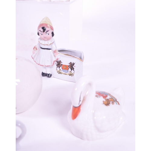 378 - Collection of early 20th century City of Bristol crested china porcelain figures. Comprised of lidde... 