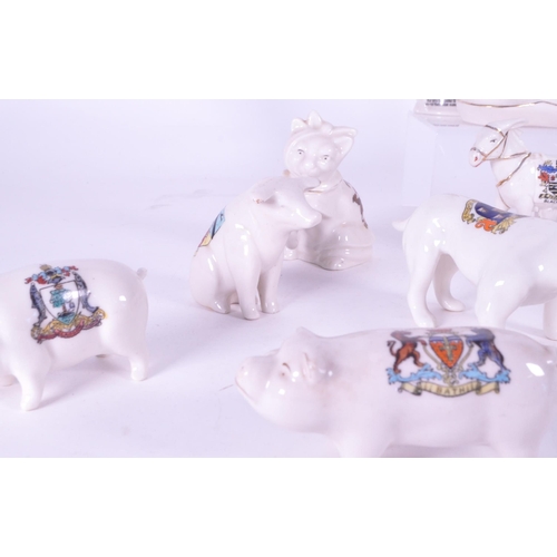 379 - Collection of early 20th century crested china porcelain figures. Makers including Arcadian, T. Lees... 