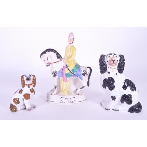 384 - A collection of three 19th century Staffordshire ceramic figures. The collection to include two span... 