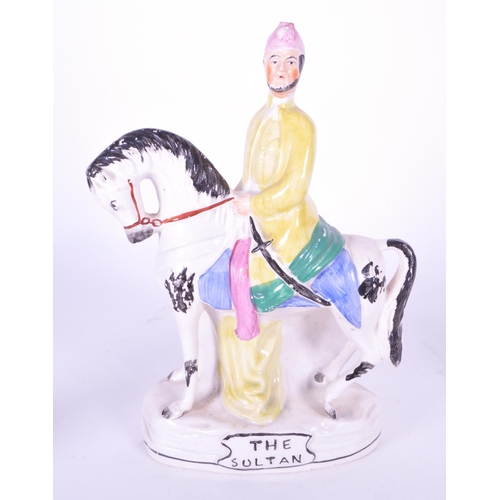 384 - A collection of three 19th century Staffordshire ceramic figures. The collection to include two span... 