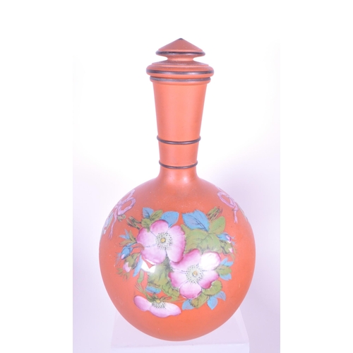 385 - A collection of 19th century Rosso Antico tableware items. To include cloche, water jugs, teapot, tw... 