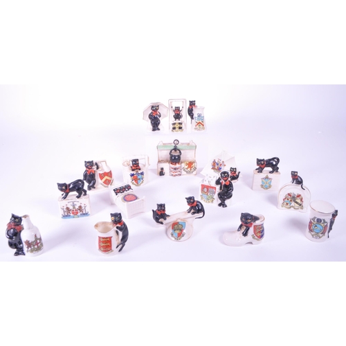387 - Arcadian - Collection of early 20th century Lucky Black Cat crested china figures. Examples includin... 