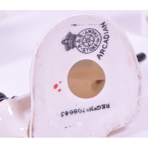 387 - Arcadian - Collection of early 20th century Lucky Black Cat crested china figures. Examples includin... 