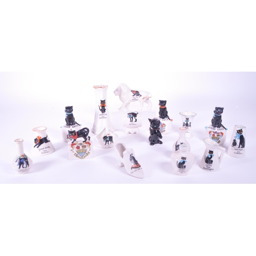389 - Collection of early 20th century crested china porcelain figures, mostly including a Good Luck greet... 