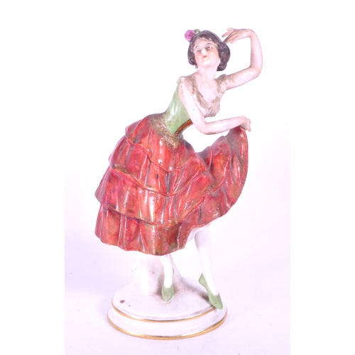 391 - Aelteste Volkstedt - Mid century German porcelain salsa dancer figure, raised on an oval plinth styl... 