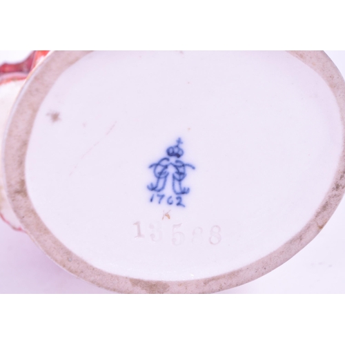 391 - Aelteste Volkstedt - Mid century German porcelain salsa dancer figure, raised on an oval plinth styl... 