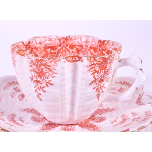 393 - Wileman for Shelley - Late 19th century porcelain cup, saucer and side plate. Trio in white and oran... 