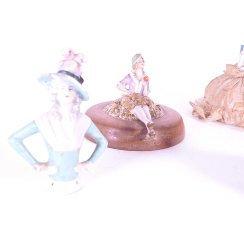395 - Collection of late 19th century / early 20th century porcelain china doll lady pin cushions, compris... 