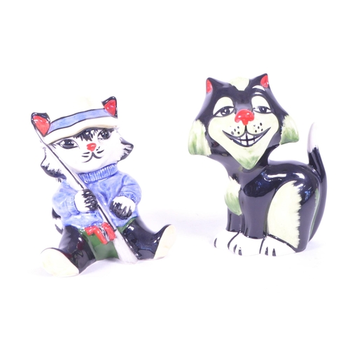 396 - Lorna Bailey (B. 1978) - Two contemporary art deco style ceramic cat figures. Comprised of a fisherm... 