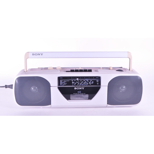 405 - Sony - A vintage 20th century radio cassette-corder. CFS-201L. Stereo speakers with carry handle in ... 
