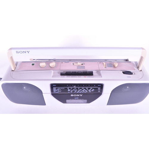 405 - Sony - A vintage 20th century radio cassette-corder. CFS-201L. Stereo speakers with carry handle in ... 