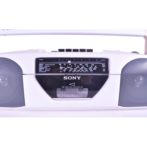 405 - Sony - A vintage 20th century radio cassette-corder. CFS-201L. Stereo speakers with carry handle in ... 