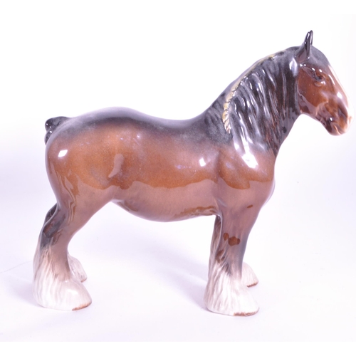 411 - John Beswick - A collection of three china porcelain Shire horse figurine / statues. Two with braids... 
