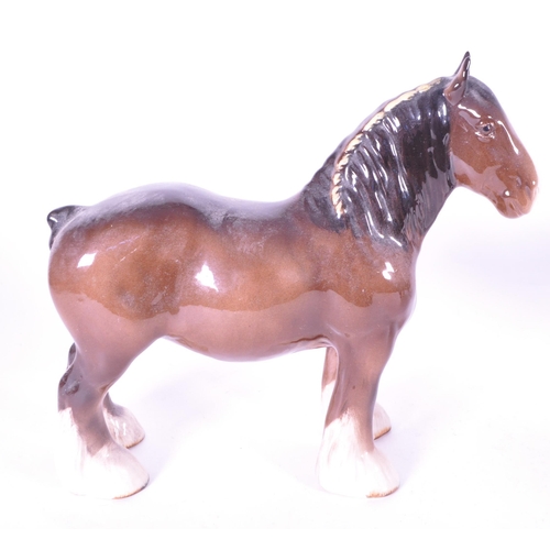 411 - John Beswick - A collection of three china porcelain Shire horse figurine / statues. Two with braids... 