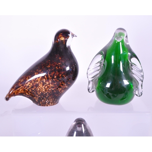 412 - A collection of vintage 20th century glass animal paperweights. To include penguins, snails, whales ... 