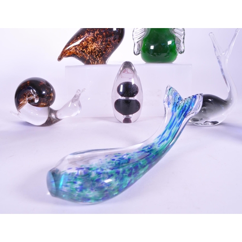 412 - A collection of vintage 20th century glass animal paperweights. To include penguins, snails, whales ... 