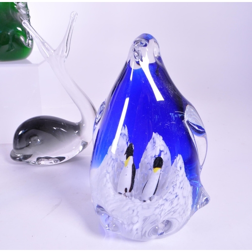 412 - A collection of vintage 20th century glass animal paperweights. To include penguins, snails, whales ... 