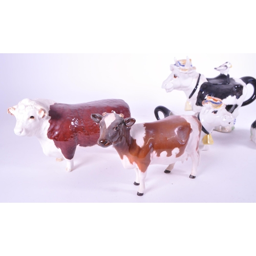418 - Beswick - A collection of porcelain cow figurines / statues. Three Beswick examples with makers mark... 