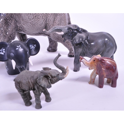 419 - Large Beswick elephant with trunk curled upwards, stamp to base of one  foot, along with a similar s... 