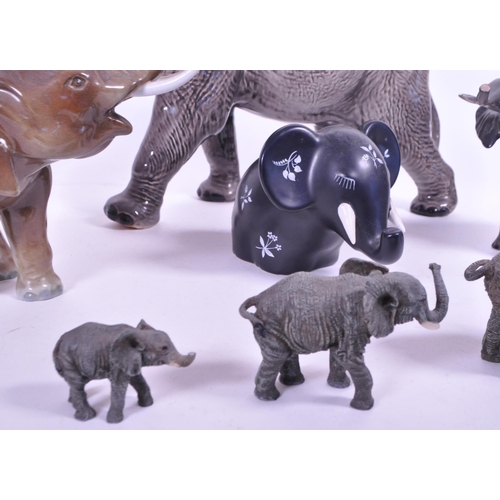 419 - Large Beswick elephant with trunk curled upwards, stamp to base of one  foot, along with a similar s... 