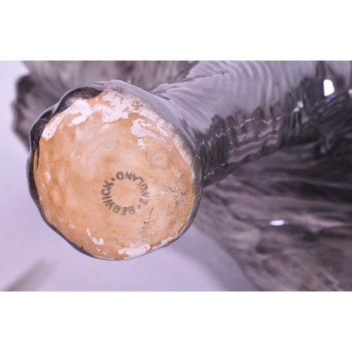 419 - Large Beswick elephant with trunk curled upwards, stamp to base of one  foot, along with a similar s... 