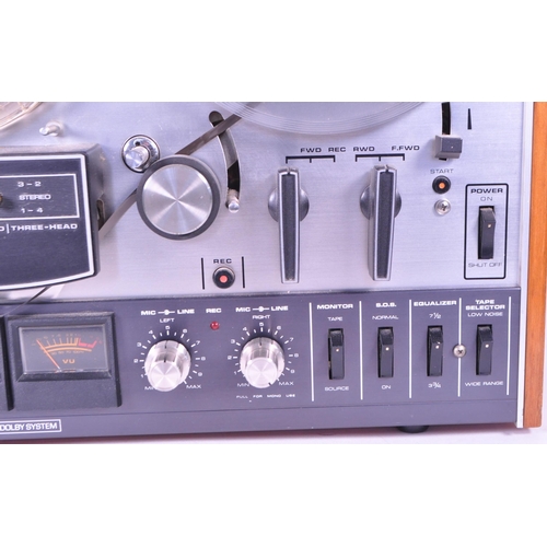 409 - Akai - A vintage 20th century Akai 4000DB three head reel to reel tape recorder. Having teak body.... 