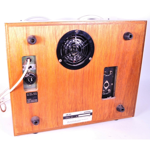 409 - Akai - A vintage 20th century Akai 4000DB three head reel to reel tape recorder. Having teak body.... 