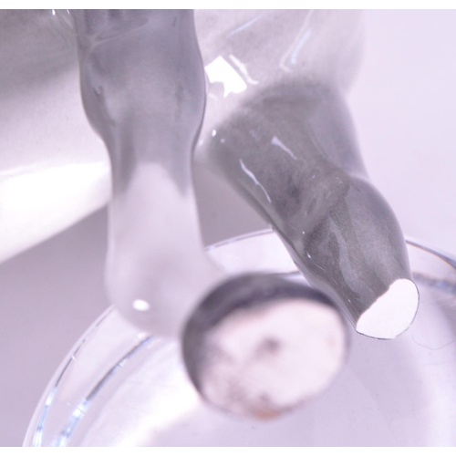 416 - Beswick / Royal Doulton - A collection of porcelain china horse figurines / statues. Including a gre... 