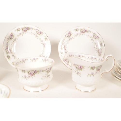 142 - Elizabeth Chantilly - 20th century bone china tea service. Comprised of twelve tea cups, milk jug, s... 