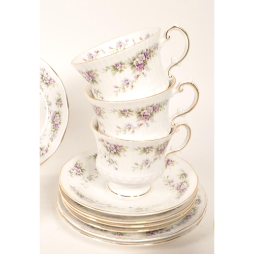 142 - Elizabeth Chantilly - 20th century bone china tea service. Comprised of twelve tea cups, milk jug, s... 