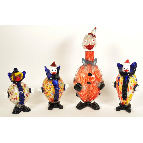 161 - Collection of four Murano style studio glass clown figures. Including a Daysun decanter in a red and... 